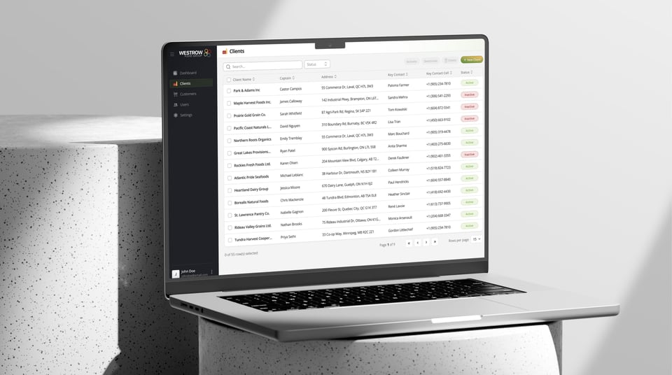 Westrow clients directory screen on a laptop standing on a concrete pedestal